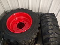 (4) 10 X 16.5 Skid Steer Tire & Rim