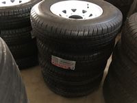    (4) Grizzly Trailer Tires on (8) Hole  Rims