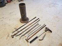    Assortment of tire tools w/ stand