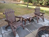    (2) Outdoor Cedar Log Chairs