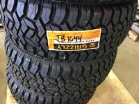    (4) Grizzly 33X12.5X 20 Tires (new)