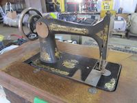    Antique Singer Sewing Machine in Table