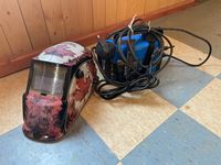    Lincoln Electric Welding Helmet & Mastercraft 20 Amp Portable Welder