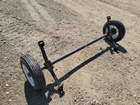    Unused Trailer Axle & Tires Assembly
