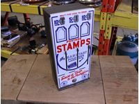    Coin Operated Postage Stamp Dispenser