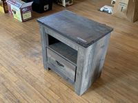   Trinell Nightstand With Rustic Finish