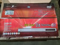    DVD Player with Boxes of Misc Cords