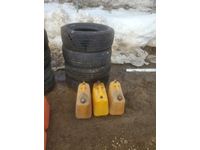    (4) 275/70R18 Tires (2 Unused, 2 Used) & (3) Jerry Cans (diesel)