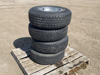    (4) Wild Country 235/75R15 Tires w/ Moto Metal Rims