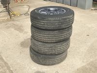    (4) Bridgestone 255/70R18 Tires W/ Jeep Rims