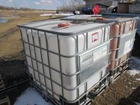    (2) 1000 Litre Caged Poly Tanks