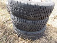    (3) 185/70R14 Winter Tires on Rims & (1) 265/75R16 Tire on Rim