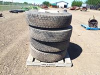    (4) 11R22.5 Tires with Rims