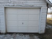    Wood & Masonite Garage Door