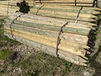   (50) 5-6 In. x 9 Ft Treated Sharp Point Posts (Unused)