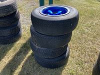    (4) 225/70R15 Tires W/ Blue Rims
