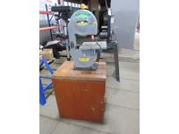    Trademaster 7.5 Inch Band Saw On Cabinet