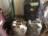    (4) Metal Green Gas Cans and (1) Poly Gas Can