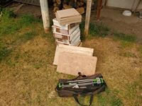    (11) Boxes of Tiles &  Tile Cutter