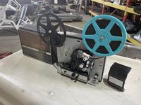    Bell Howell Auto Load Film Projector with Home Films