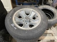    (4) Superguard 215/65R15 Tires on 5 Bolt Rims