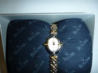    Bulova Ladies gold and silver watch