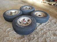    (4) 235/75R15 Tires