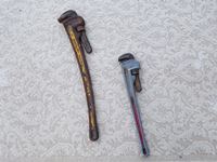    (1) 36 Inch Pipe Wrench, (1) 24 Inch Pipe Wrench
