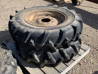    (2) Dunlop Tires w/ Rims