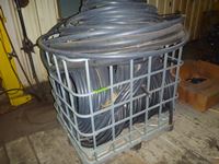    Caged Tote of Poly Hose