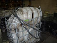    Tote of 1 Inch White Poly Hose
