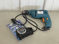    Electric Drill and Tape Measure