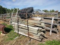    Assorted Posts & Barb Wire on Rack