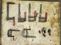    Assortment of Clamps and Pipe Cutters