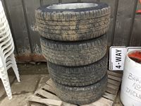    (4) Firestone 275/70R20 Tires on Rims