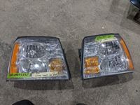    Pair of 2013 GMC Sierra Head Lights