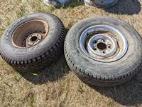    (2) 235/75R15 Tires with Rims