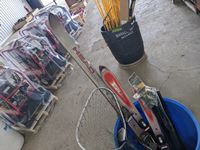    (3) Pairs of Skis, Fishing Net, Putter and Pole Extensions