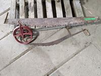    Hand Saw and 12 Inch Pulley