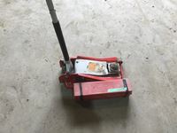    Floor Jack and Safety Triangles