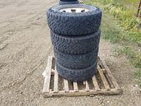    (4) Goodyear Wrangler Duratrac 265/75 R16 Tires w/ Rims