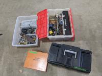 assorted drill bits, screwdrivers, chisels, and hand tools