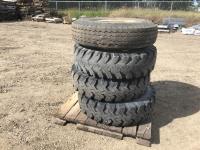 (4) 10.00-20 Tires with Rims