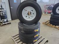 (4) Grizzly St235/85R16 Tires On Rims