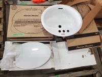 (2) Toilet Seats and (2) Sinks
