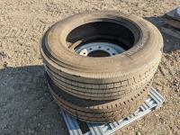 (1) 22.5 Inch Trailer Tire and 22.5 Inch Drive Tire On Steel Rim