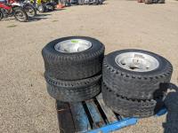 (2) 9.50-16.5LT & (2) 12.00-16.5LT Truck Tires on Aluminum Rims