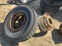 (4) 22.5 Inch Steel Rims W/ (1) 11R22.5 Tire
