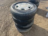 (4) 215/70R15 Tires W/Rims