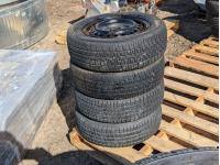 (4) P185/65R14 Radial Tires On Steel Wheels